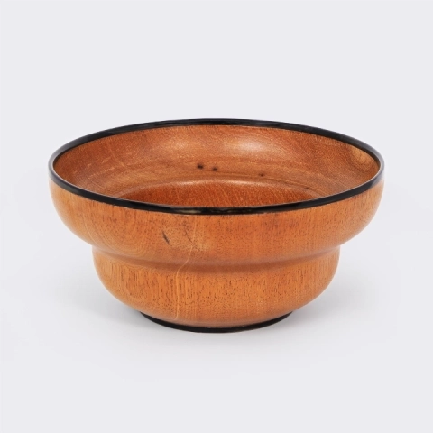 Handcrafted mendoravy wooden bowl from Madagascar with a double-structured rim and black horn trim.