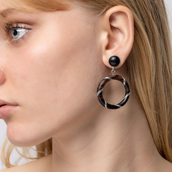 Image showcasing the earrings in use 
