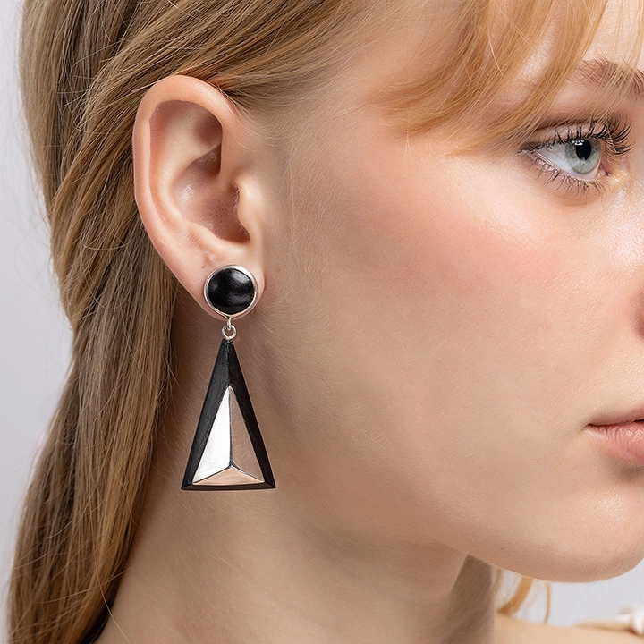 Image showcasing the earrings in use 