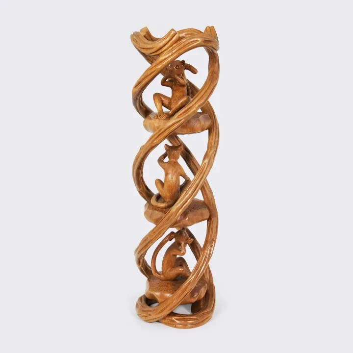 Intricate vertical wood carving featuring the Three Wise Monkeys motif interlaced with a spiral vine, handcrafted from solid exotic wood