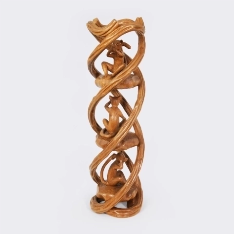 Intricate vertical wood carving featuring the Three Wise Monkeys motif interlaced with a spiral vine, handcrafted from solid exotic wood