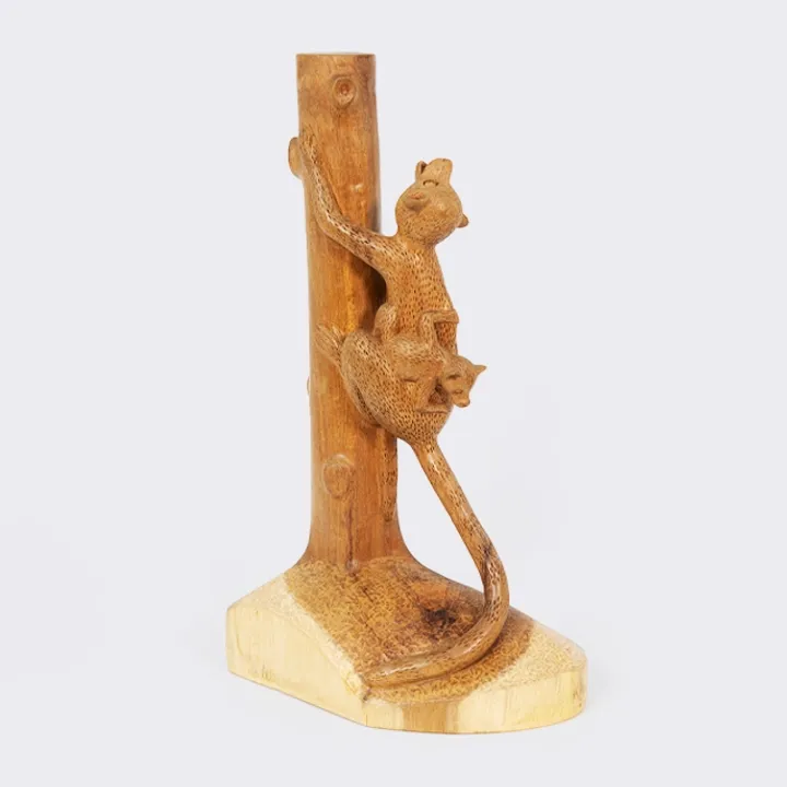 Elegant handcrafted statue depicting a mother Maki (lemur) climbing a tree trunk with her baby, made in Madagascar.