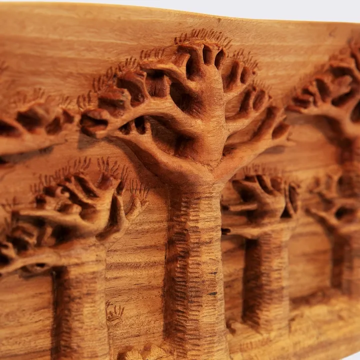 Elegant decoration: panoramic wooden relief sculpture depicting the Avenue of the Baobabs of Madagascar