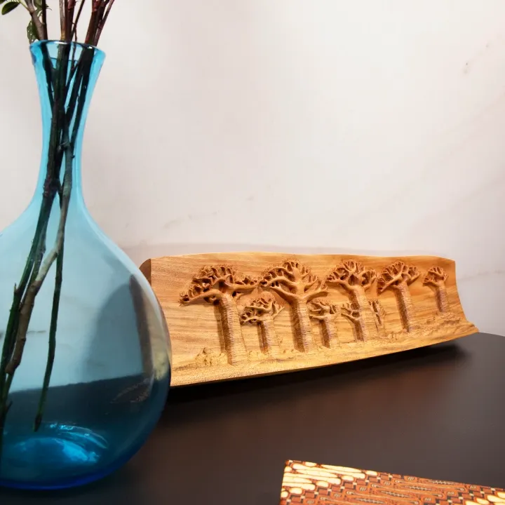 Elegant decoration: panoramic wooden relief sculpture depicting the Avenue of the Baobabs of Madagascar