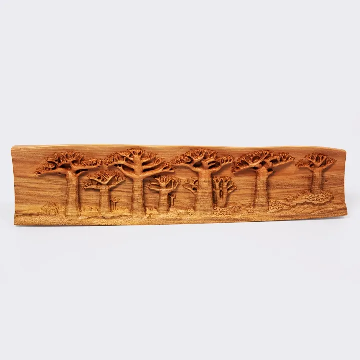 Elegant decoration: panoramic wooden relief sculpture depicting the Avenue of the Baobabs of Madagascar