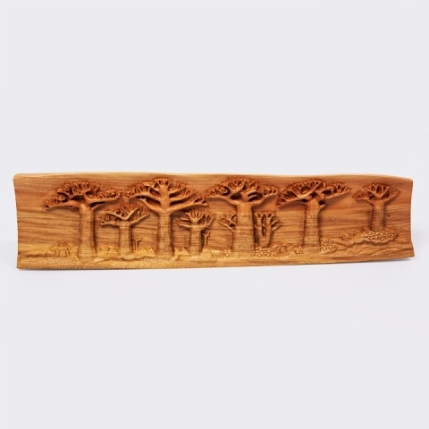 Elegant decoration: panoramic wooden relief sculpture depicting the Avenue of the Baobabs of Madagascar