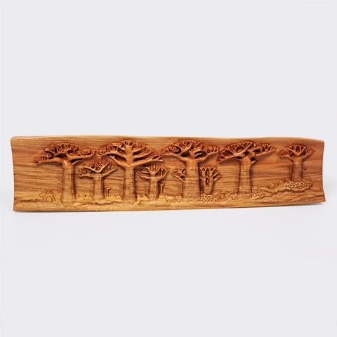 Elegant decoration: panoramic wooden relief sculpture depicting the Avenue of the Baobabs of Madagascar