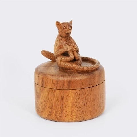 Handcrafted wood round box featuring a sculpted sitting Lemur on the lid, authentic Madagascar artisanry.