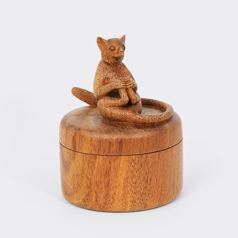 Handcrafted wood round box featuring a sculpted sitting Lemur on the lid, authentic Madagascar artisanry.