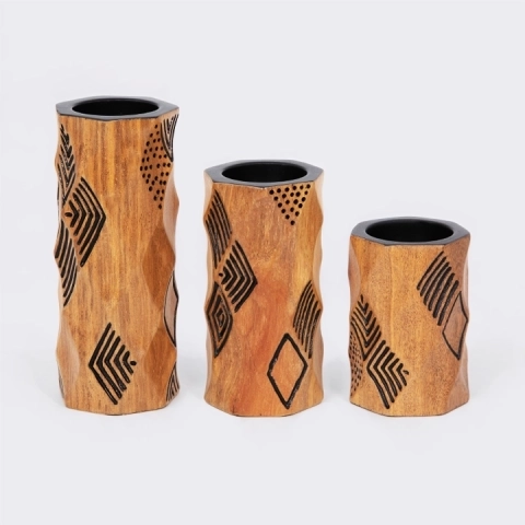Square wooden candlestick, tall and unique, painted black with hand-carved tribal geometric patterns, handcrafted in Madagascar.