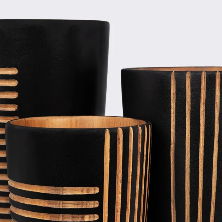 Handcrafted conical vase in solid wood, with a modern design of engraved vertical and horizontal lines.