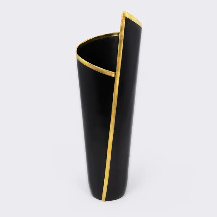 Rotating view of the Handcrafted architectural vase with a pleated design, matte black finish, and gold brass trim.