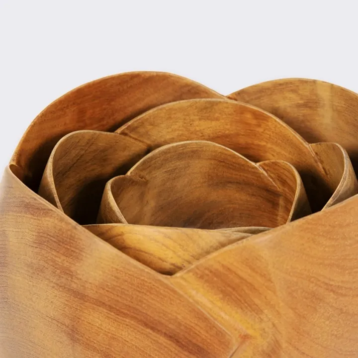 Rotating view of the Handcrafted sohihy wood bowl with a sculptural flower design, artisan made in Madagascar.