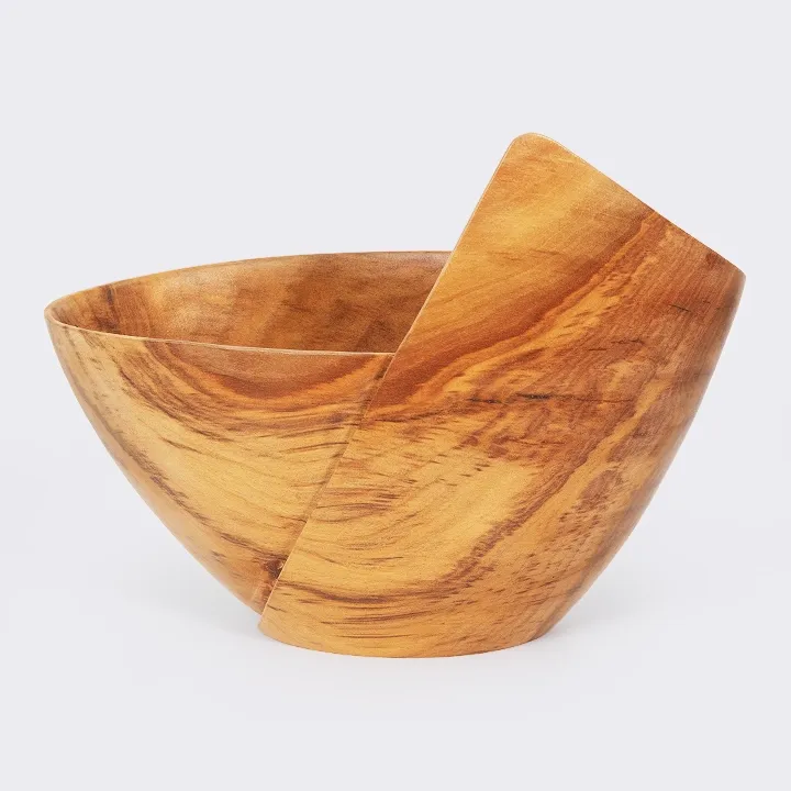 Rotating view of the Handcrafted Sohihy wooden bowl with a unique asymmetrical folded shape, inspired by modern skyscraper architecture.