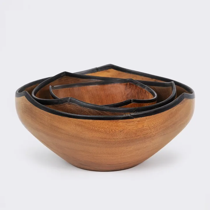 Trio of handcrafted wooden serving bowls with a sculptural water lily shape and contrasting horn rim.