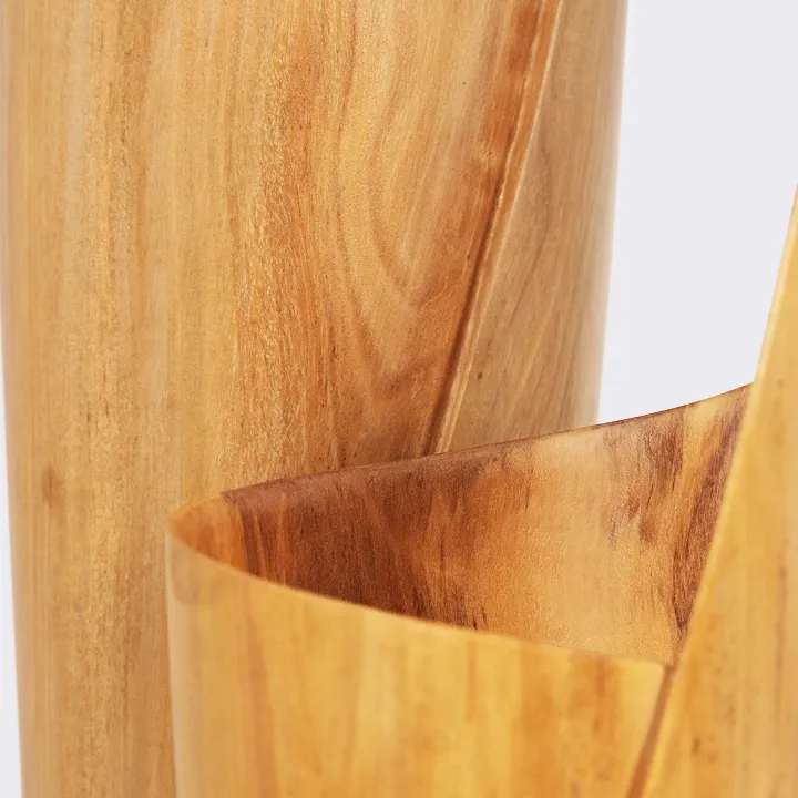 Close-up view of the sculptural folded rim and natural wood grain of a modern wooden vase.