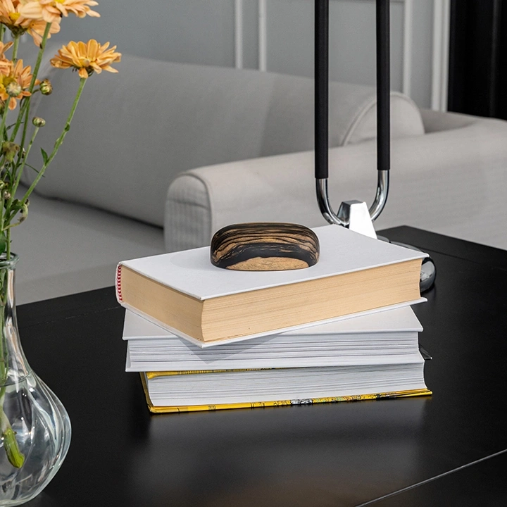 Image showcasing the paperweight in use.