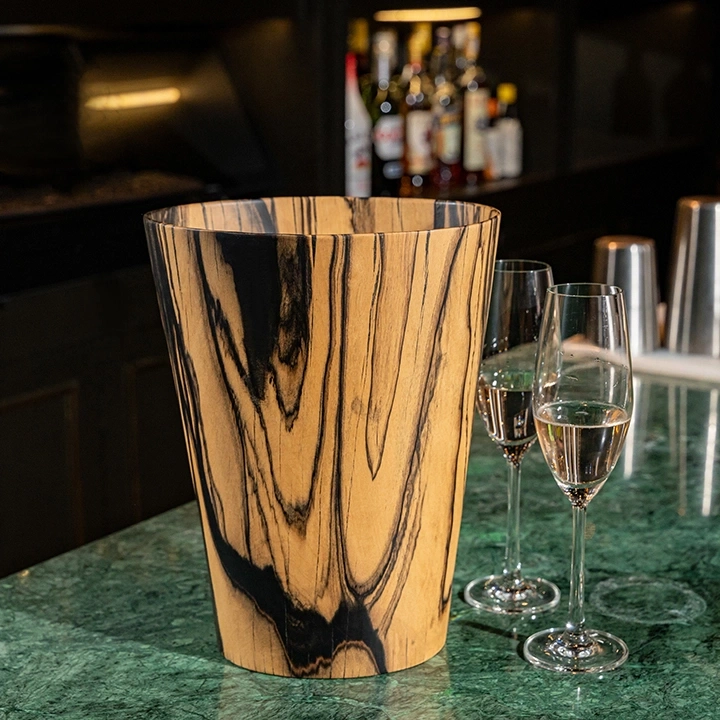 Rotating view highlighting the champagne bucket's features.