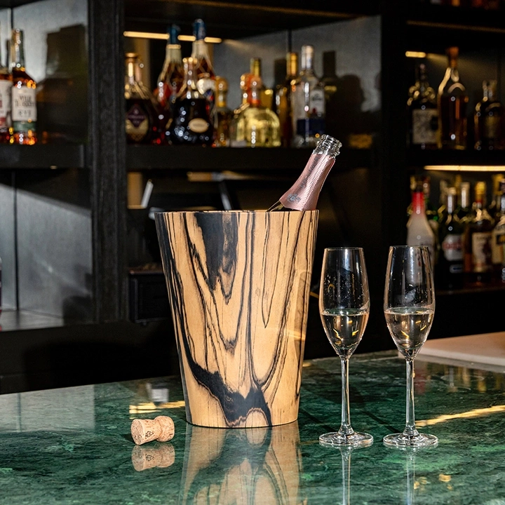 Rotating view highlighting the champagne bucket's features.