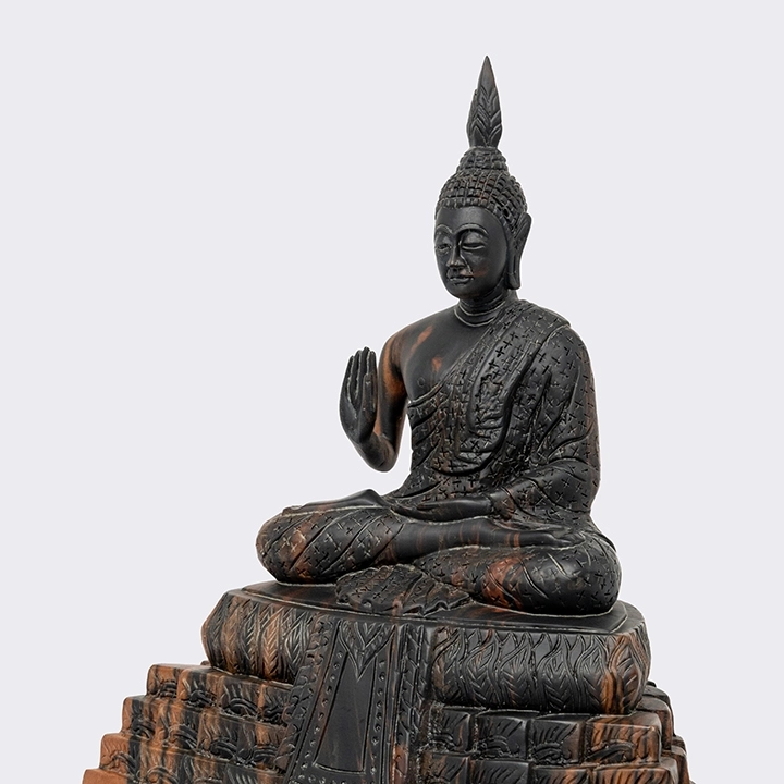 Detail studio picture of the Sitting Buddha  