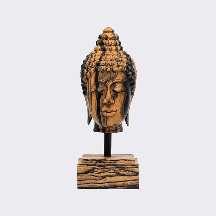 Studio picture of the Buddha Head Short Haircut on Pedestal