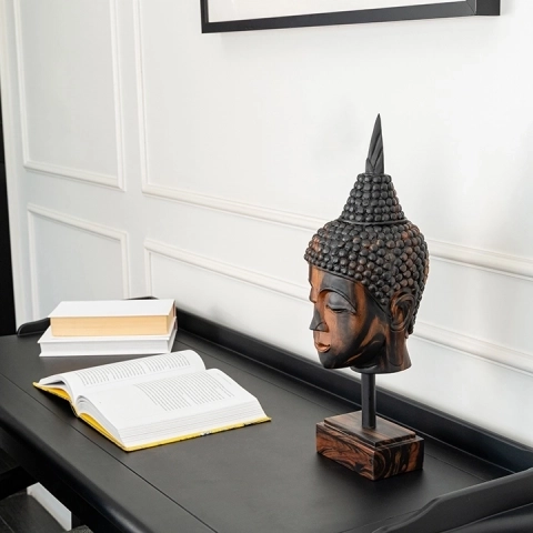 Picture in situ of the Buddha Head Tall Parted Haircut on Pedestal 