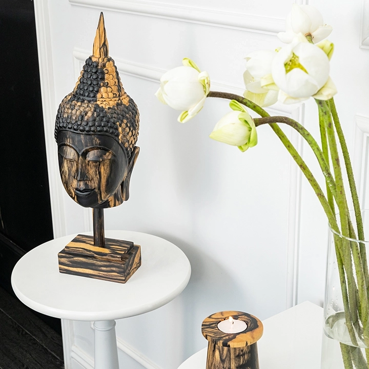 Image showcasing the Buddha head in use