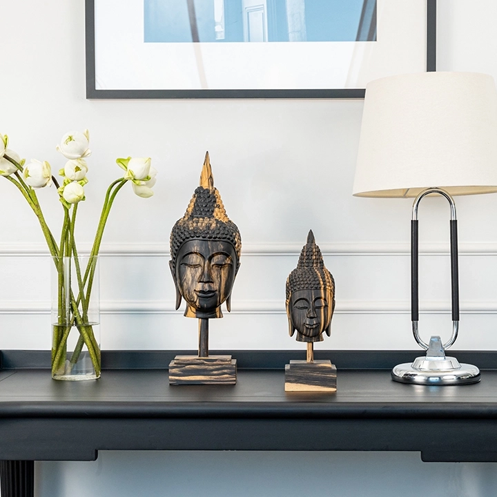 Image showcasing the Buddha head in use