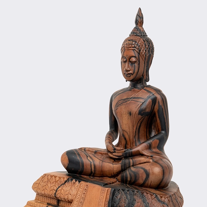 Close-up view of the Buddha sculpture's details.