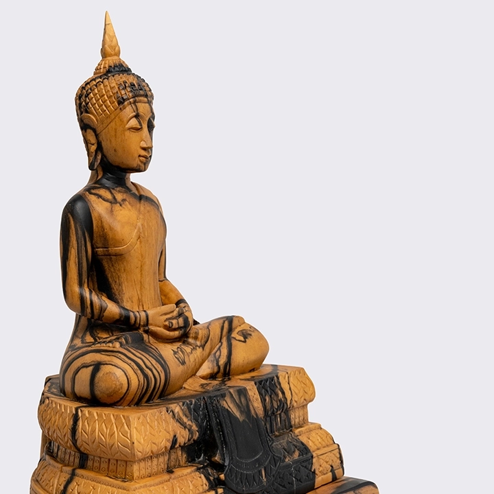 Rotating view highlighting the buddha sculpture's features.