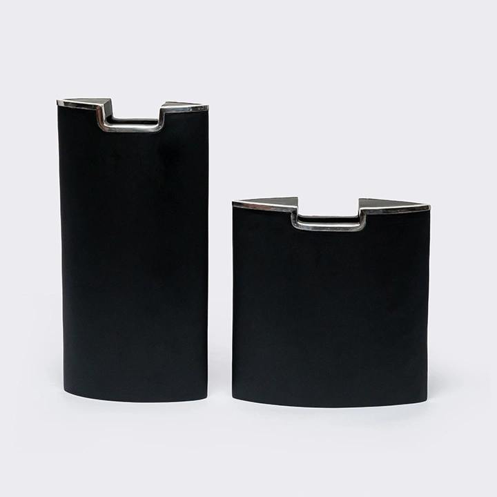 Studio shot featuring a set of vases