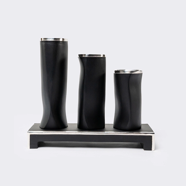 Studio shot featuring a set of vases.