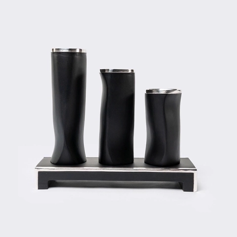 Studio shot featuring a set of vases.